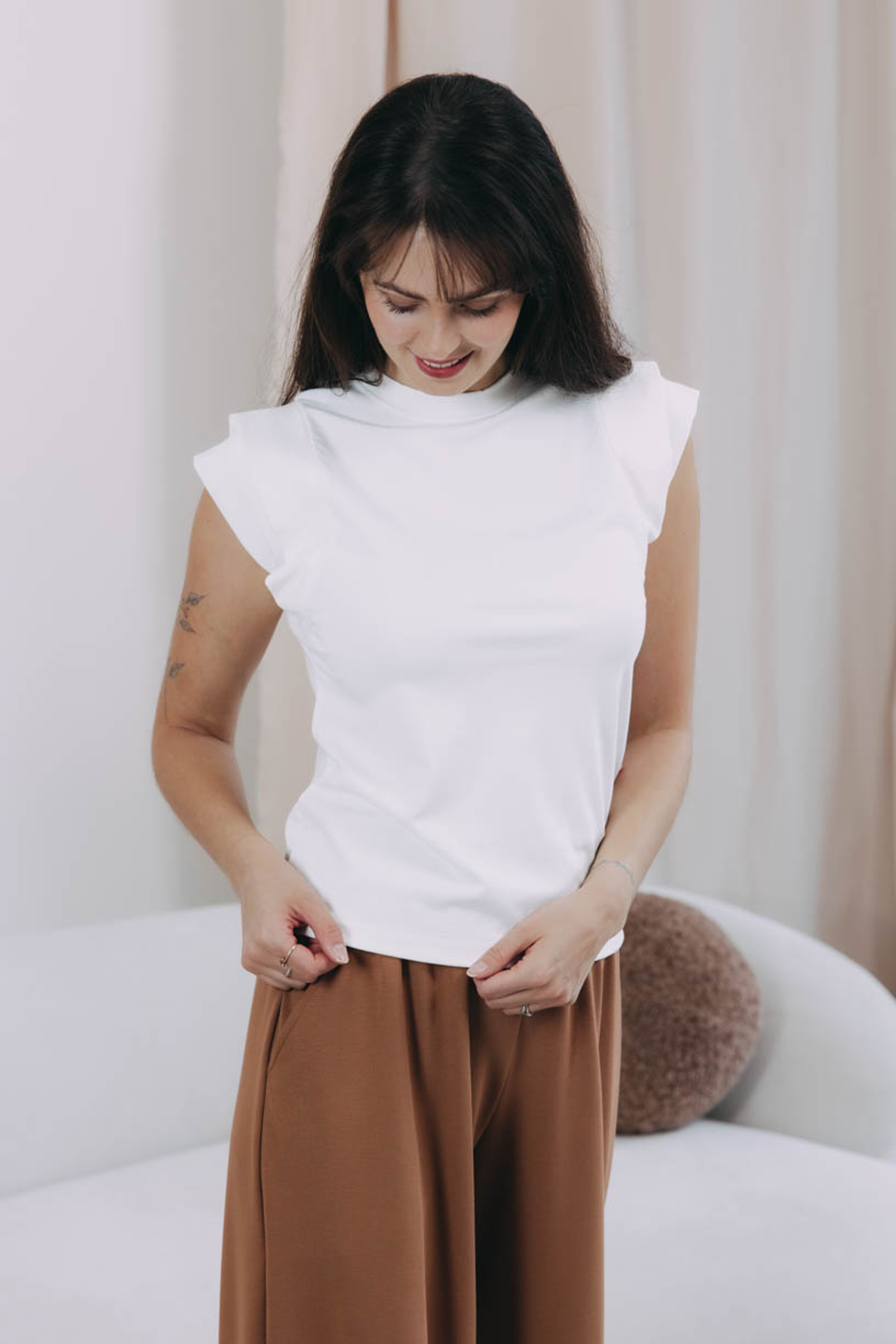 Káťa má na sebe pri svojej výške 170 cm veľkosť XS.