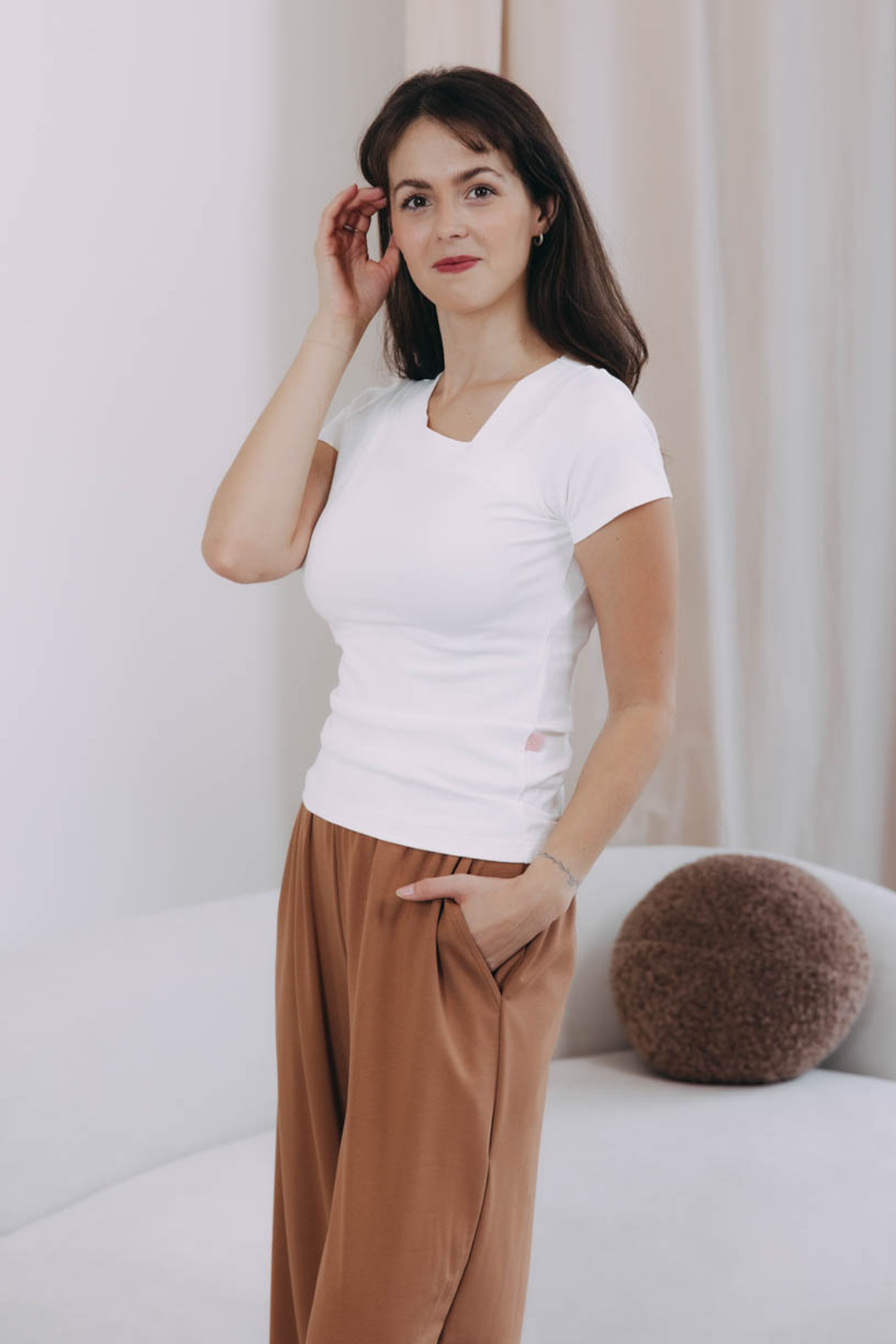 Káťa má na sebe pri svojej výške 170 cm veľkosť XS.